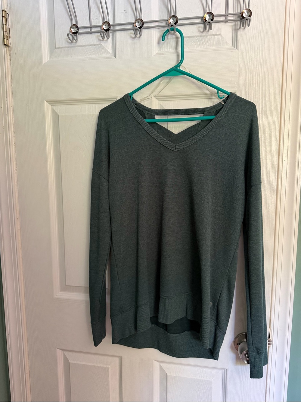 Balance Collection Relaxed V-Neck Sweater in Deep Teal